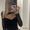 Μαύρο τοπάκι με καπς και διαφάνεια στα μανίκια, κομψό και θηλυκό.